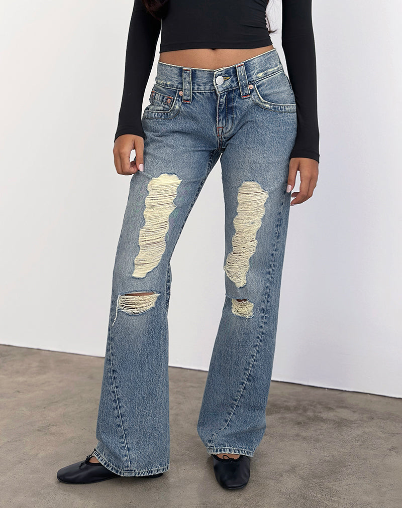 Low Rise Twisted Seam Ripped Jean (azul)
