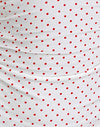 Blanco con microestampado de lunares rojos