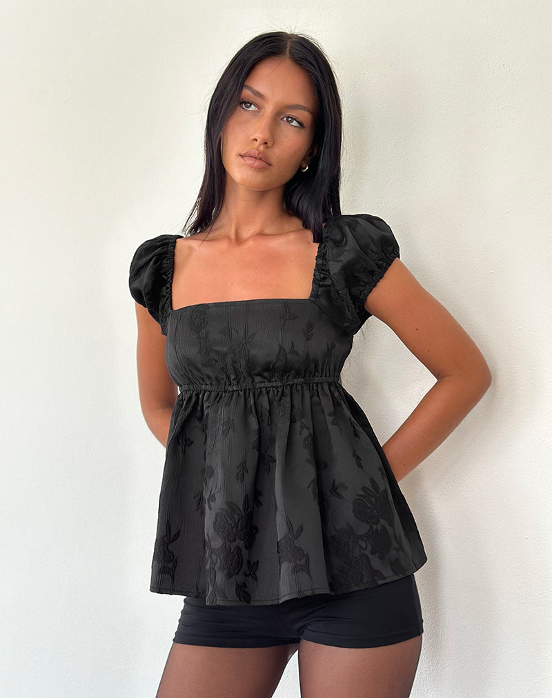 Top Malea Peplum en jacquard satinado negro
