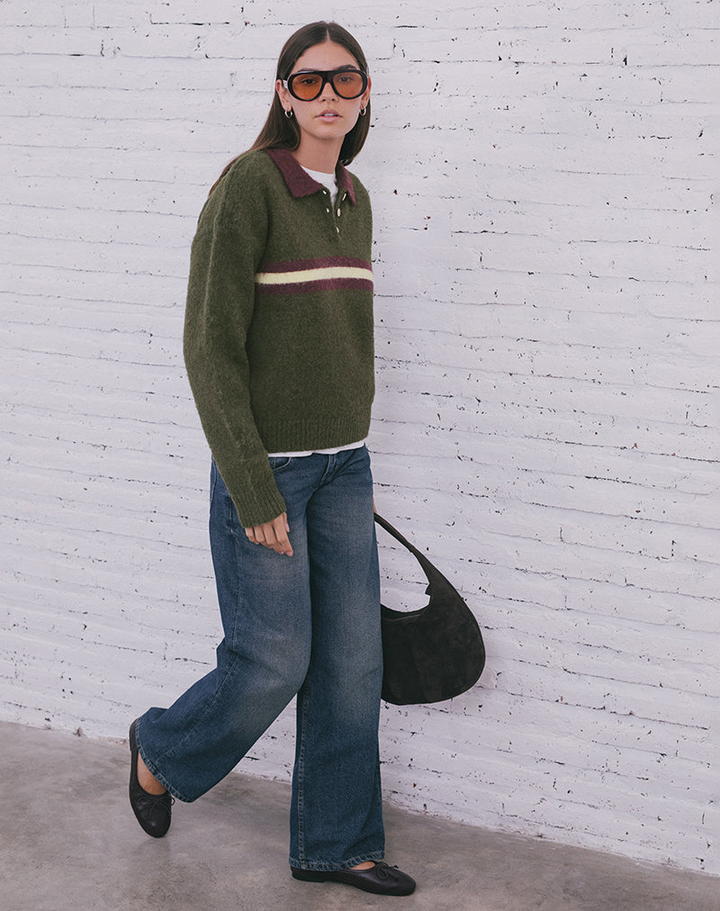 Imagen del jersey Marvina en punto verde con rayas amarillas.