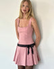 Imagen del minivestido Michelia rosa con lazo negro