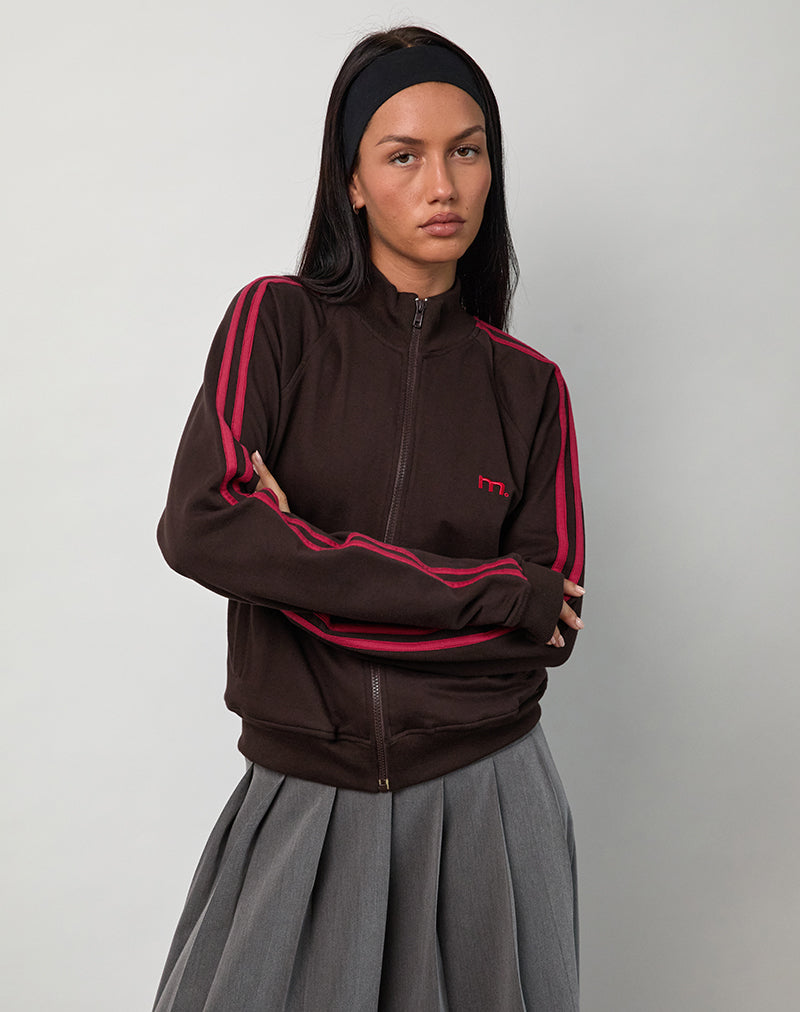 Chaqueta Niskala en chocolate amargo con ribetes y bordados en rojo adrenalina