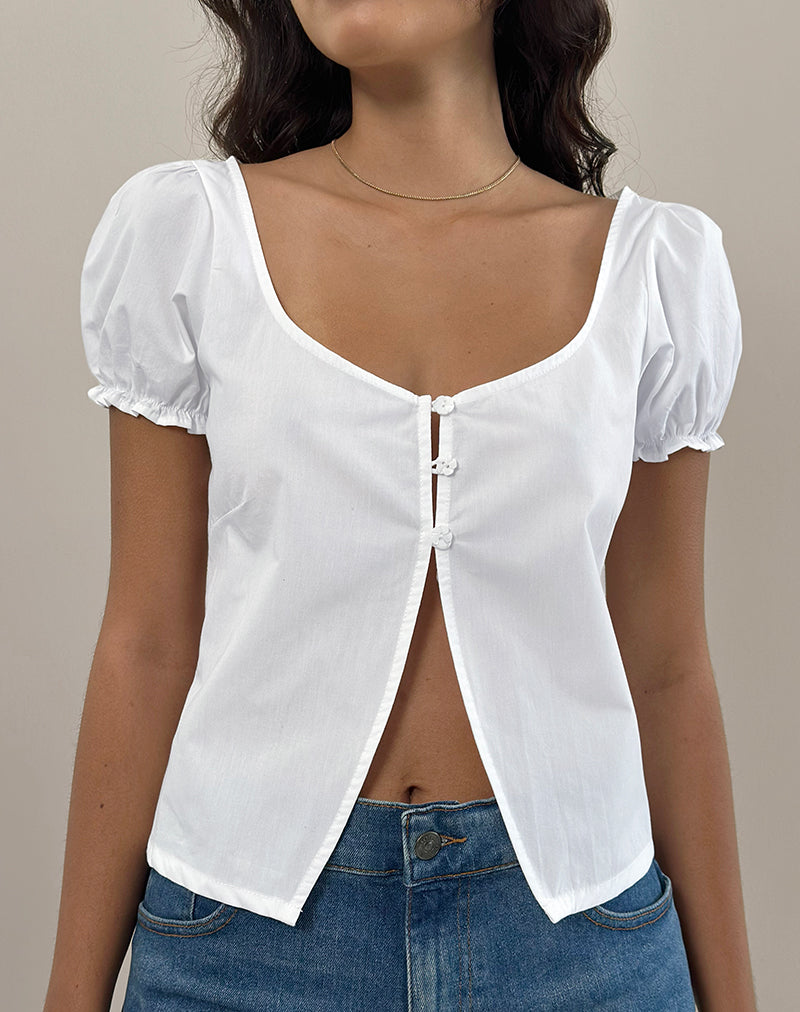 Top Norya de popelín blanco con mangas abullonadas