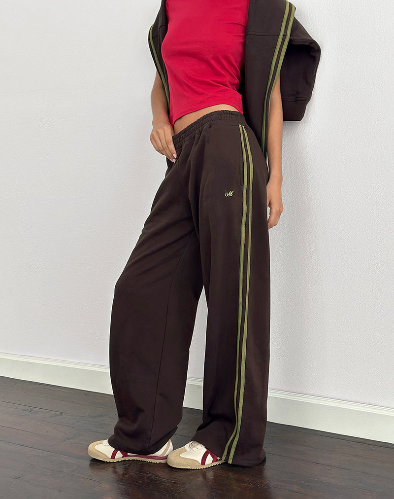 Imagen de Oze Trackpant en chocolate amargo con ribete verde y bordado M