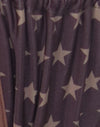 Estampado de estrellas marrón con encuadernación de contraste