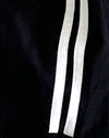 Negro con raya blanca