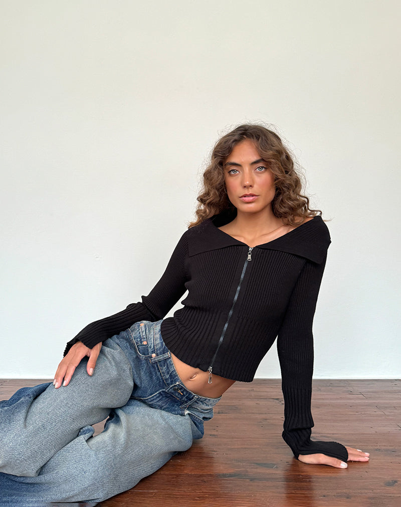 Jersey Radia de manga larga y hombros descubiertos con cremallera en negro