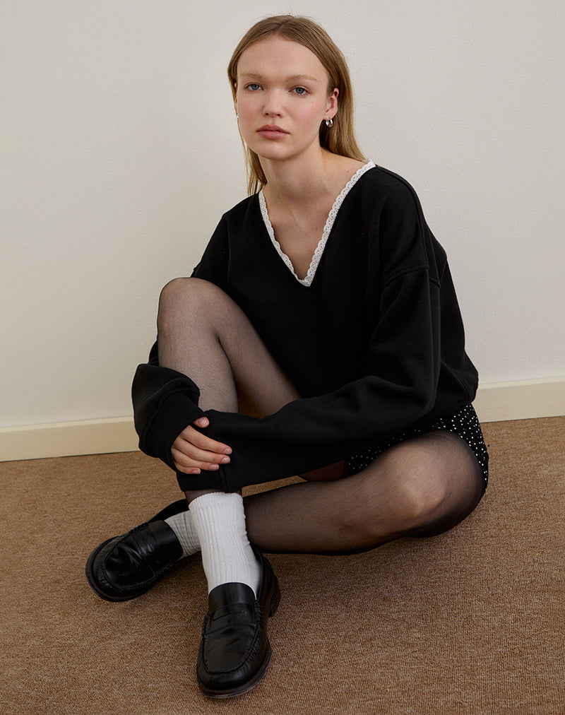 Imagen de Rodyn Jumper Negro con Picotado Blanco