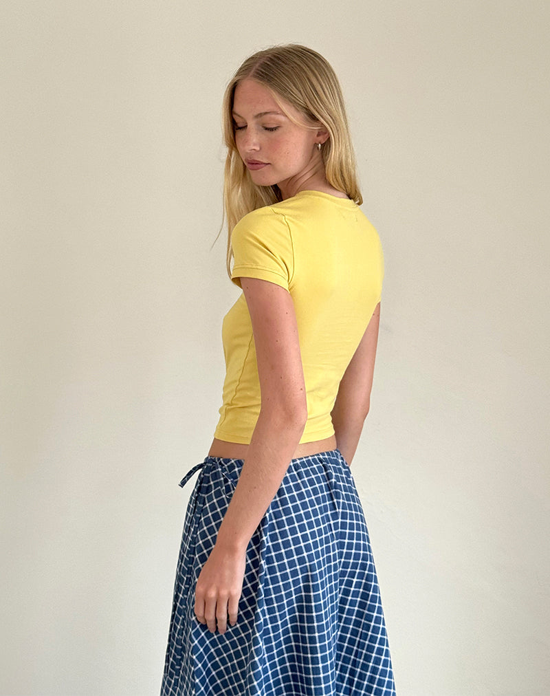 imagen de Salida Top en amarillo con motivo de manzana