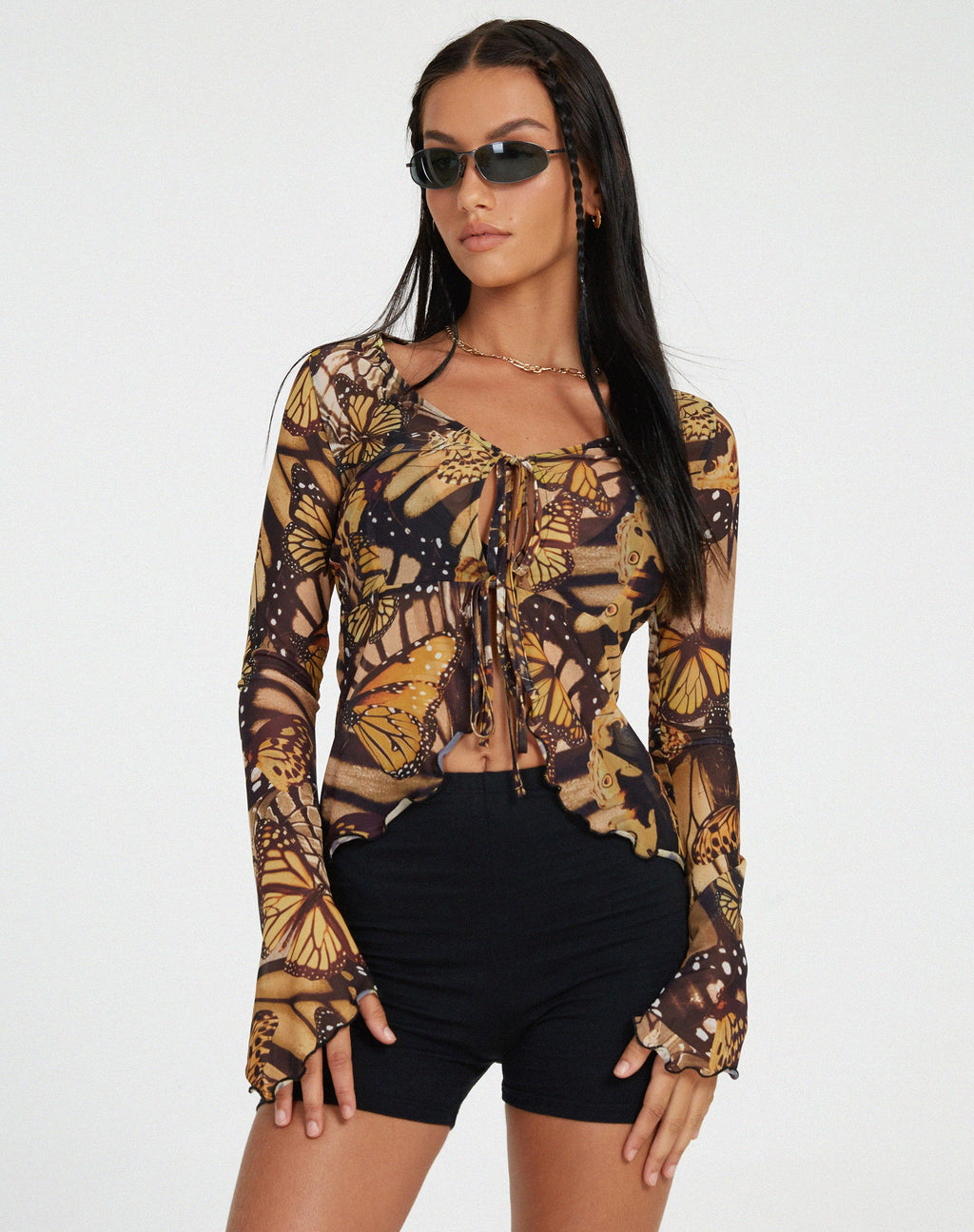 Sansa Cardi en oro mariposa