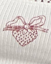 Blanco roto con estampado de lazos de fresa