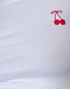 Blanco con bordado de cerezas rojas