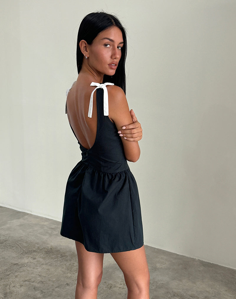 Minivestido Taleshi en negro con lazos blancos de zapato de claqué