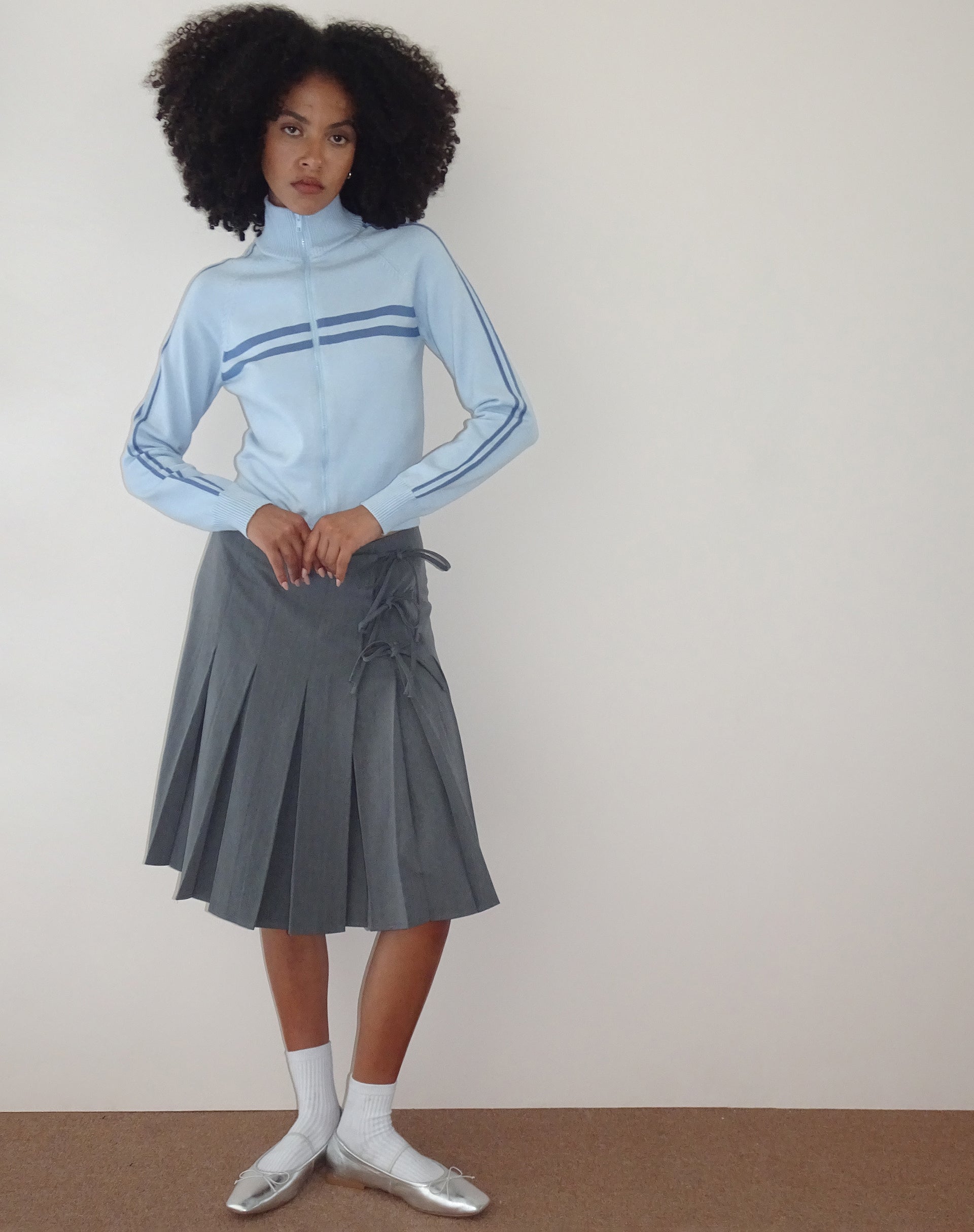 Imagen de Talisa Chaqueta deportiva de punto azul claro con cremallera