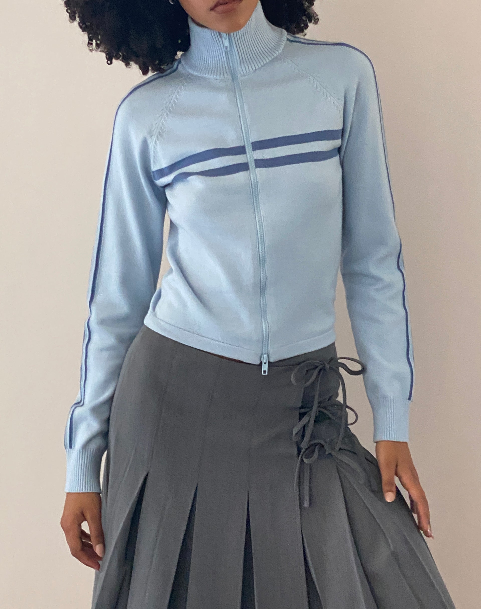Imagen de Talisa Chaqueta deportiva de punto azul claro con cremallera