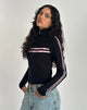 Imagen de Talisa Chaqueta con cremallera en negro con raya rosa