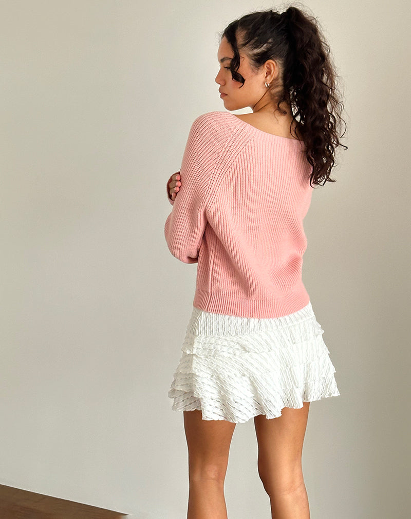Imagen del jersey Tami de punto rosa con lazo blanco bordado