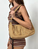 Imagen del bolso Teria Tassel en ante color canela