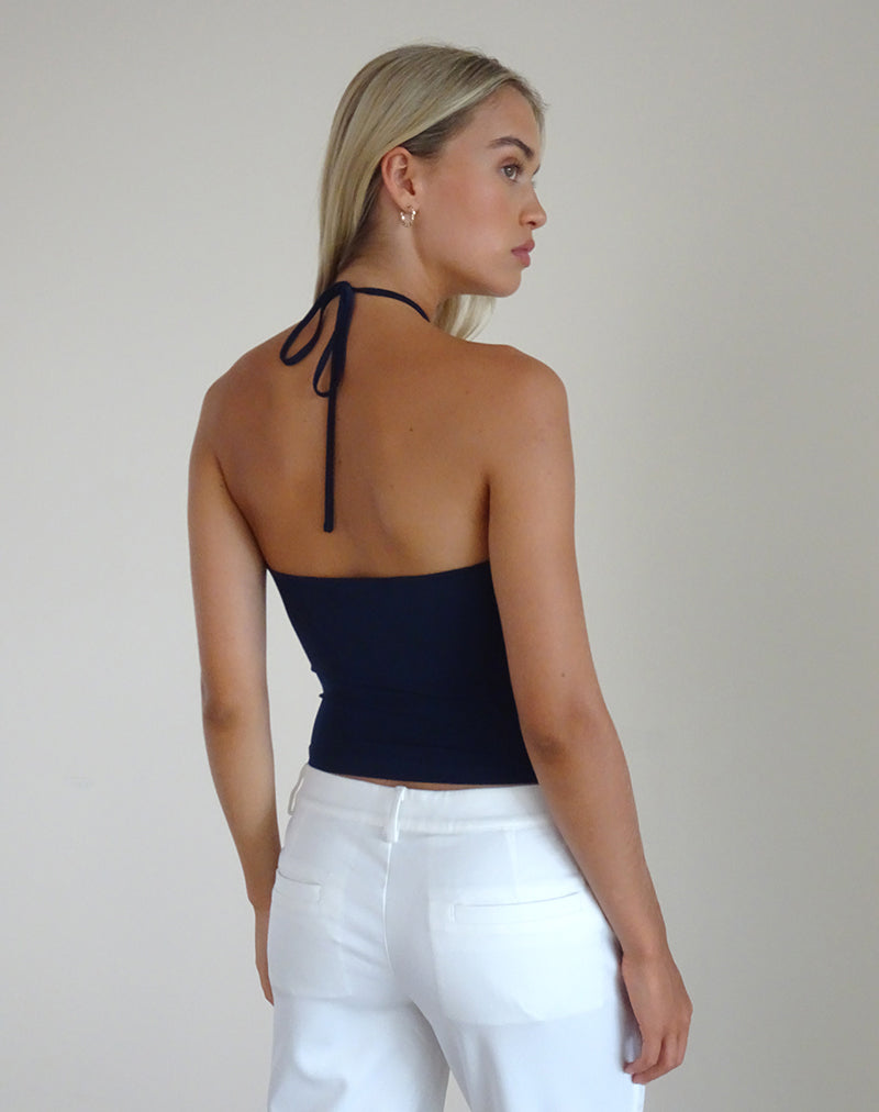 Imagen de Tarrina Top Cuello Haltern en Azul Marino con Rosetón Blanco
