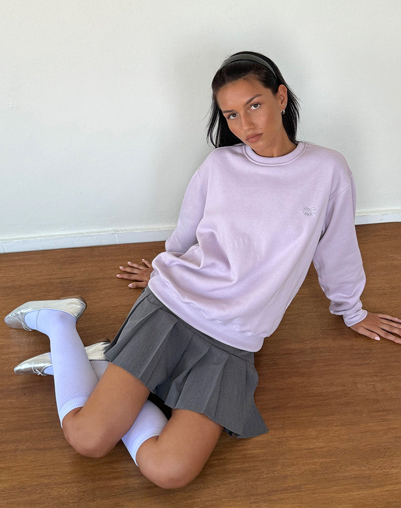 Imagen del jersey Tillie en violeta con lazo gris bordado