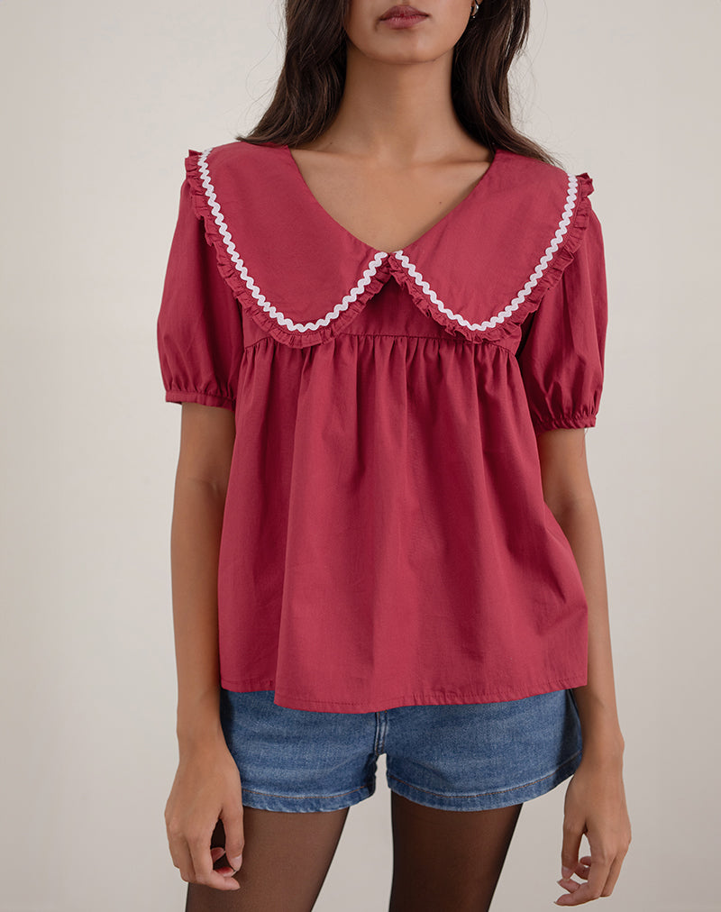 Imagen de la blusa Viana en rojo adrenalina con ribete blanco
