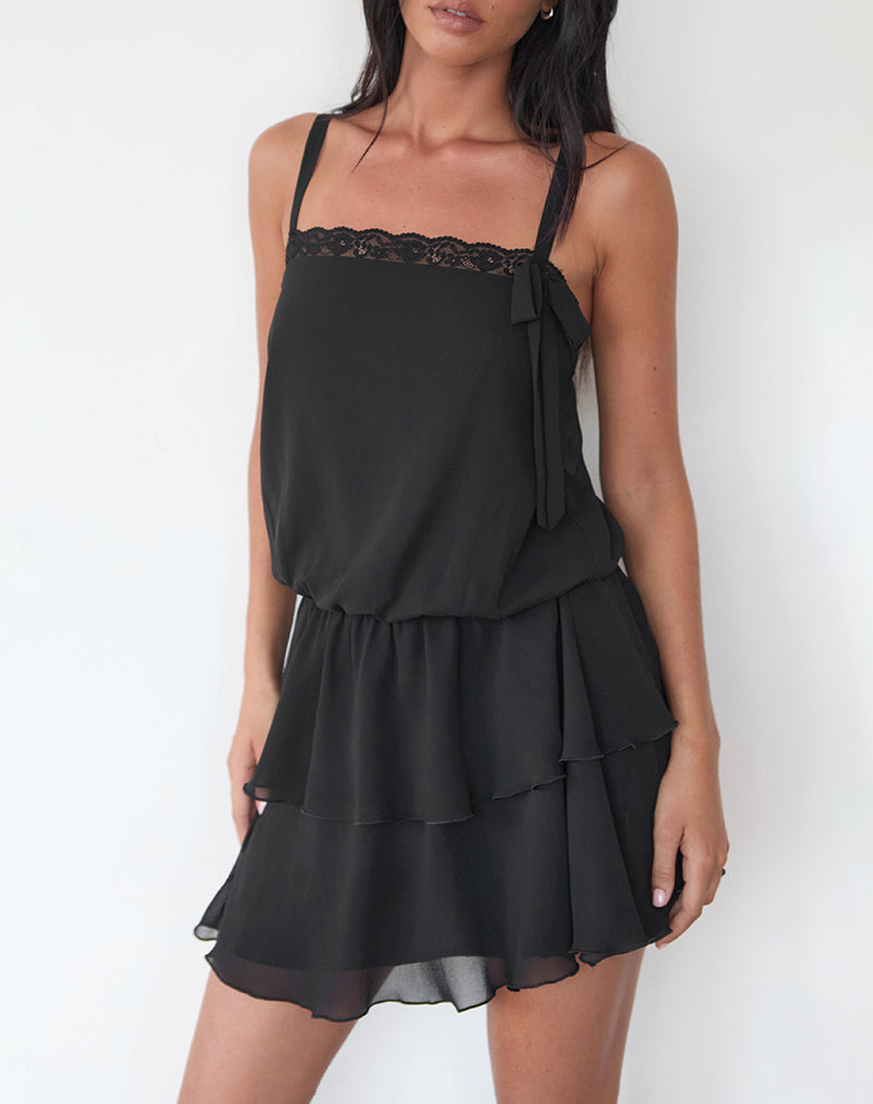 Minivestido Wasinah de gasa negra con adornos de encaje
