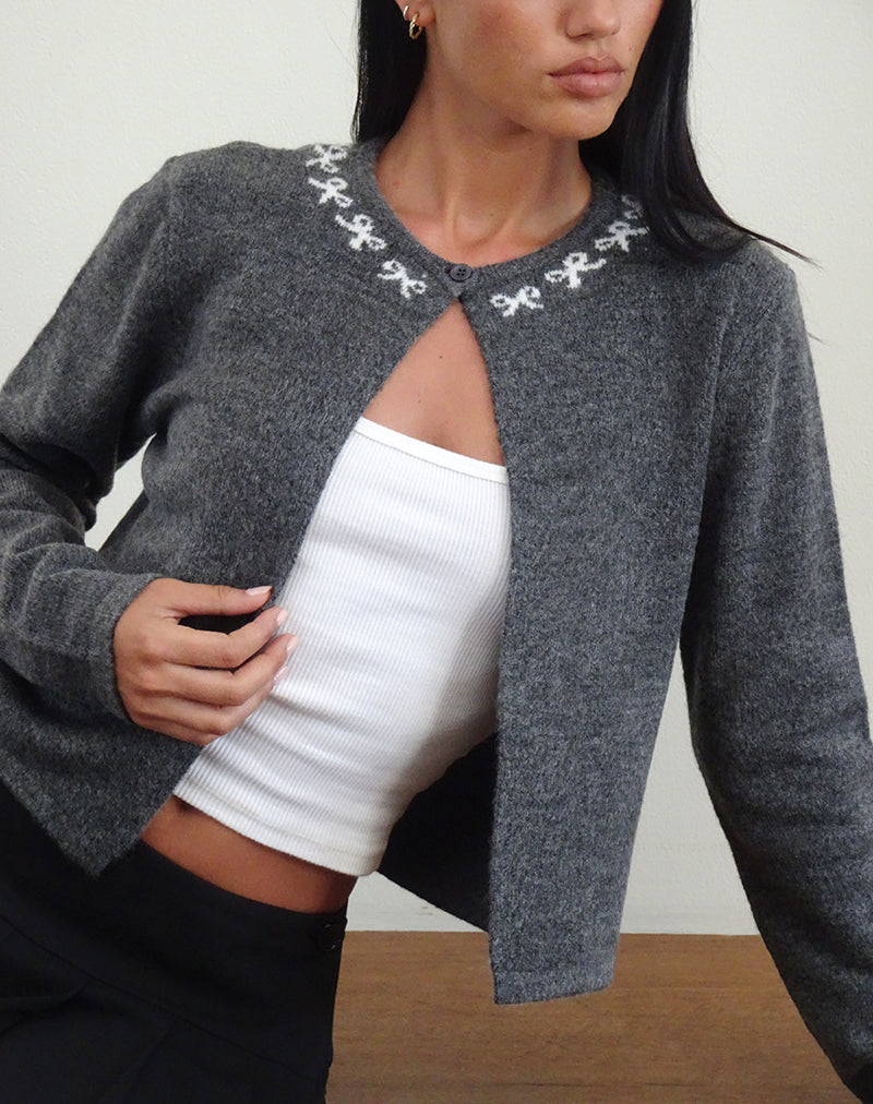 Cárdigan Wunara gris con lazos marfil