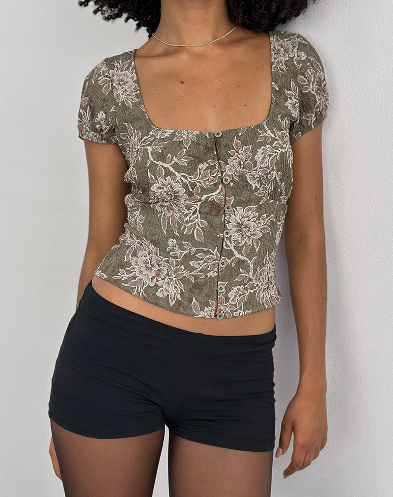 Imagen de la blusa Yakova en tejido floral verde