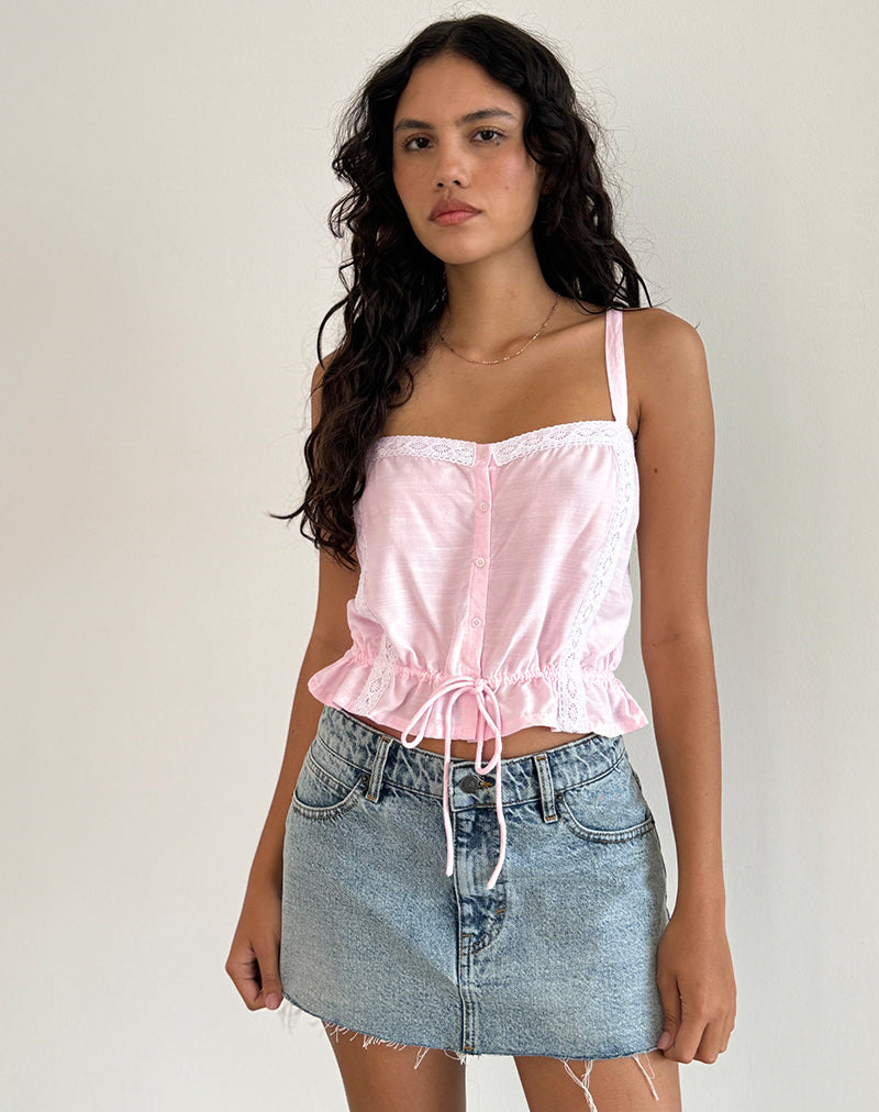 Top con tirantes Zaria en rosa claro con ribete blanco