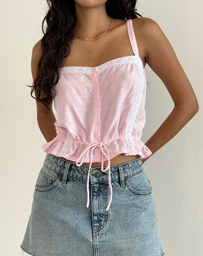 Top con tirantes Zaria en rosa claro con ribete blanco