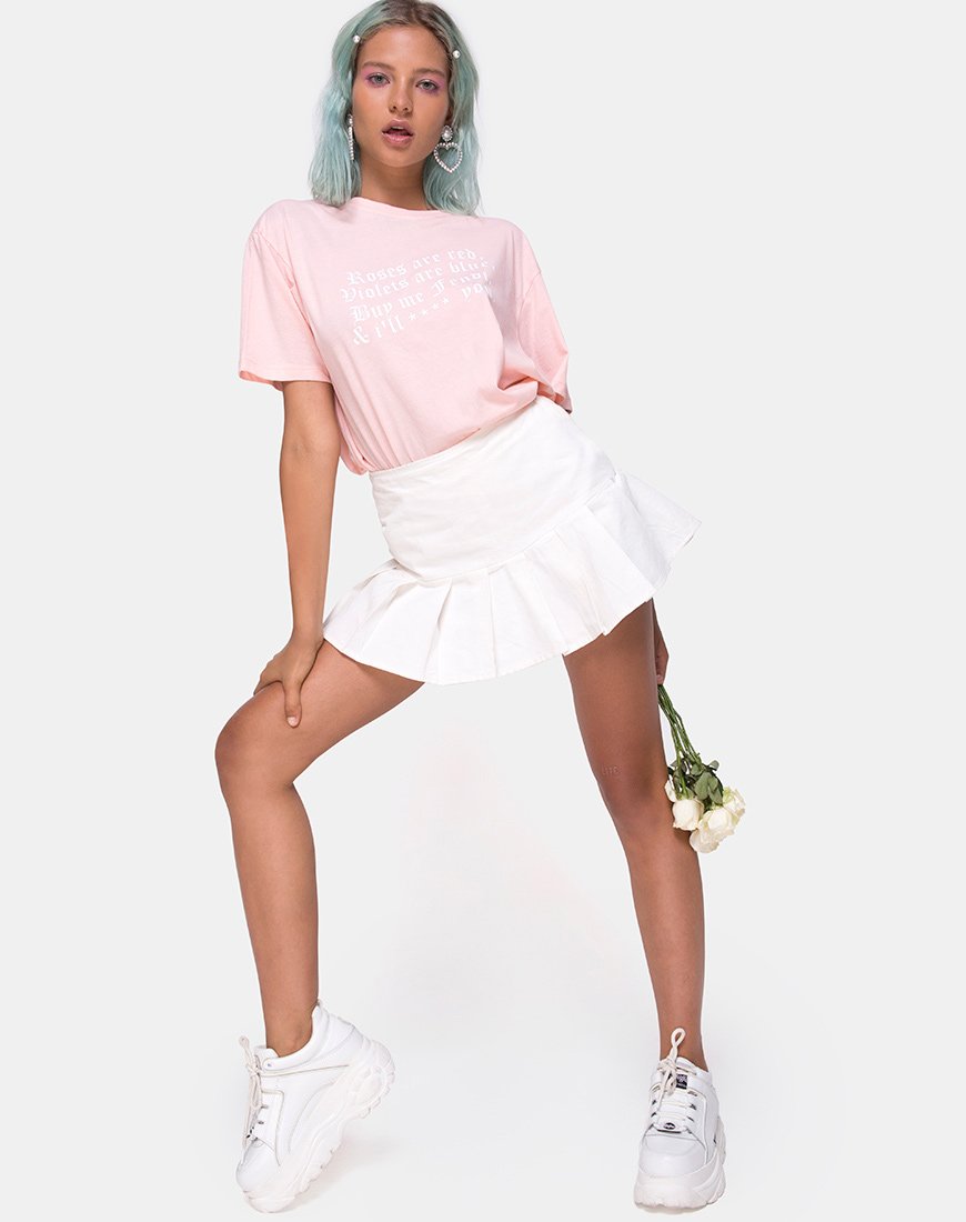 Image of Camiseta básica oversize en rosa con texto rosas son rojas X Top Niña