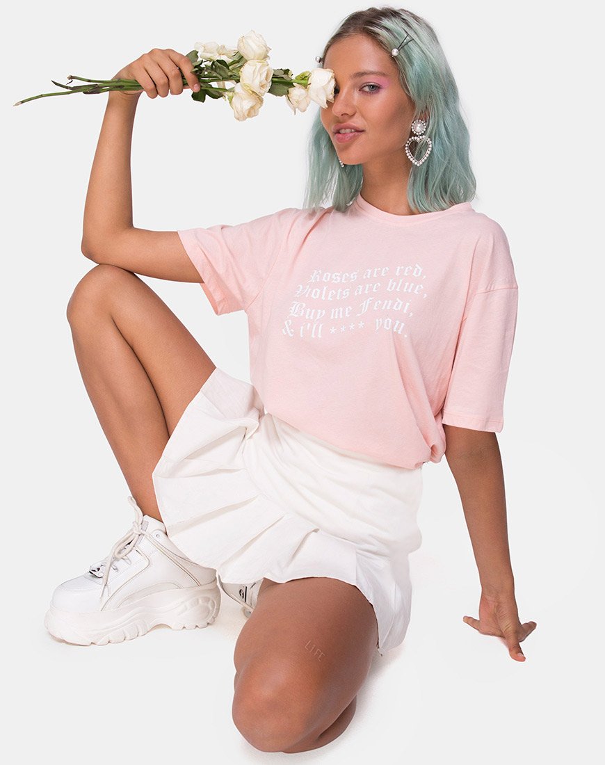 Image of Camiseta básica oversize en rosa con texto rosas son rojas X Top Niña