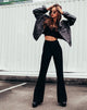 Imagen de los pantalones Herlom Flare en negro
