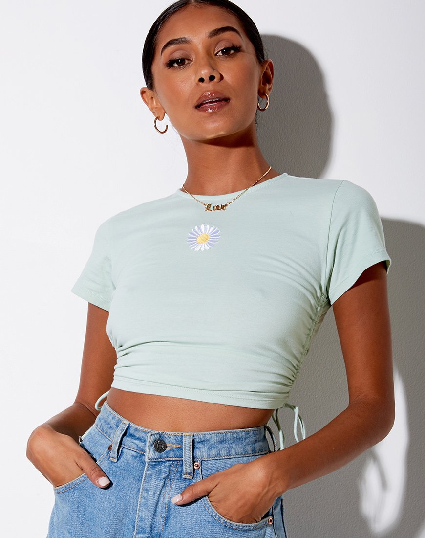 Doga Crop Top en suave pistacho con bordado de margaritas