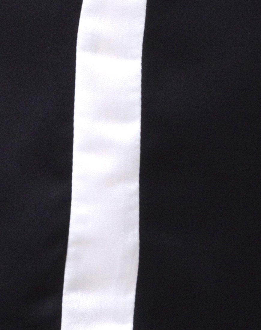 Imagen del vestido camisero Dore en negro con raya marfil