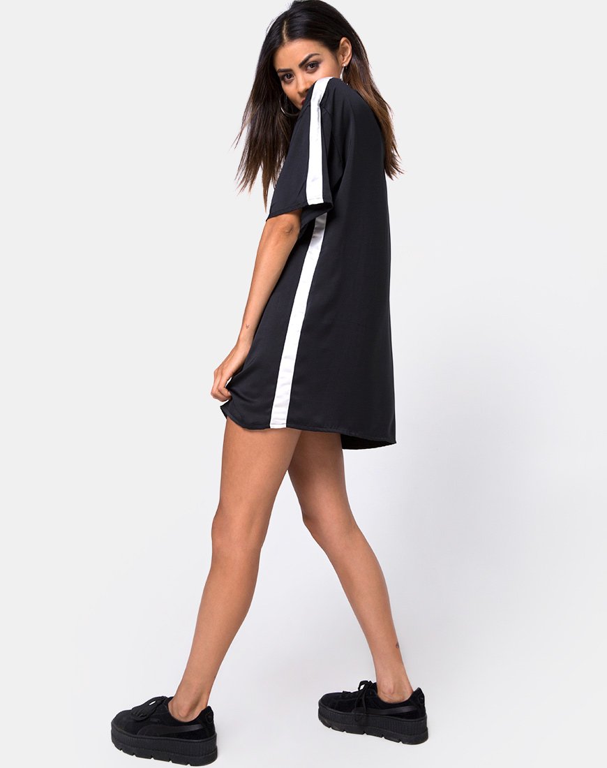 Imagen del vestido camisero Dore en negro con raya marfil
