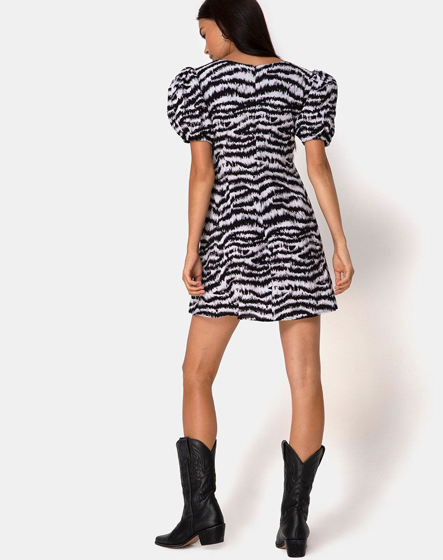 Imagen del vestido Elcia en gris gota animal