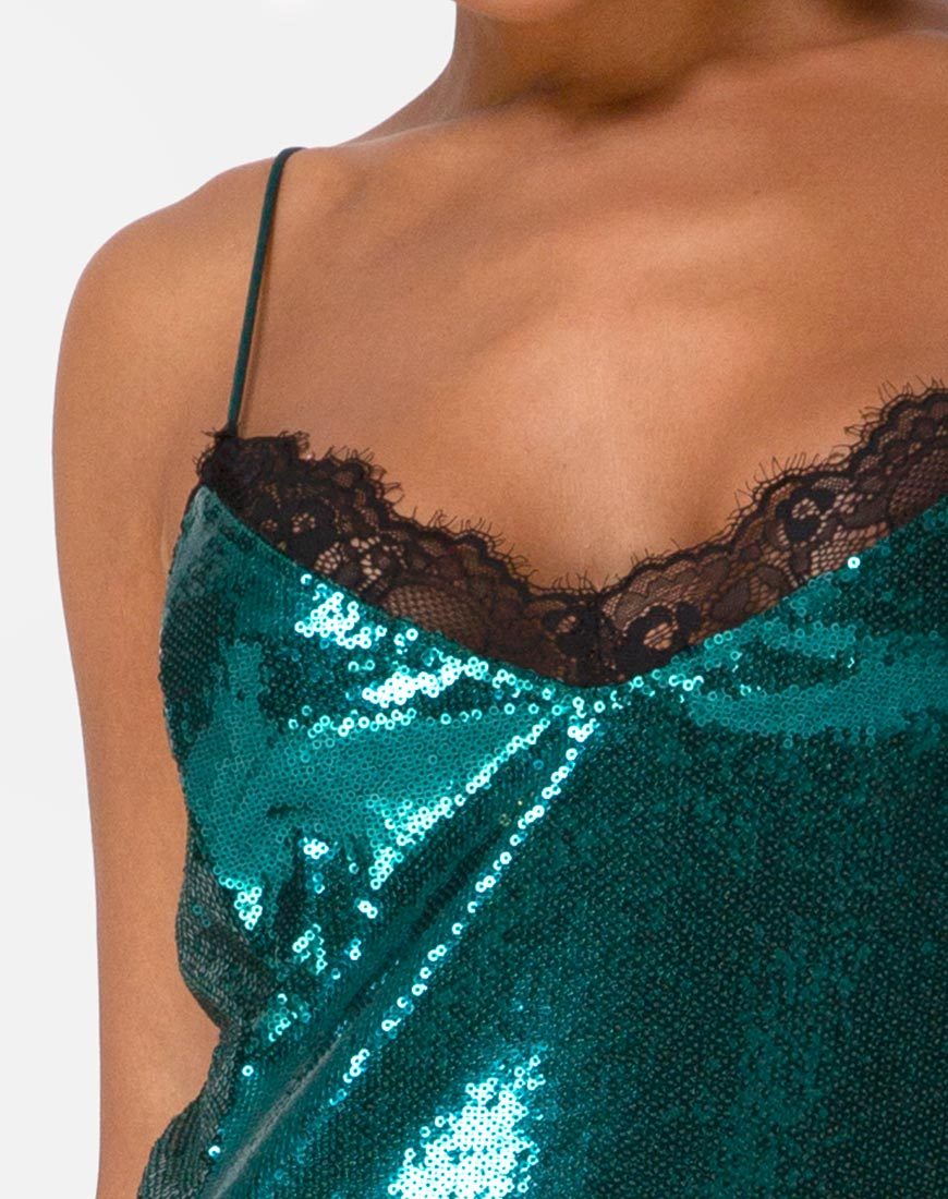Imagen del vestido Fitilia de mini lentejuelas verde azulado con encaje negro