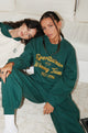 Imagen de la sudadera Glan en verde bosque con bordado Winning Team Mix