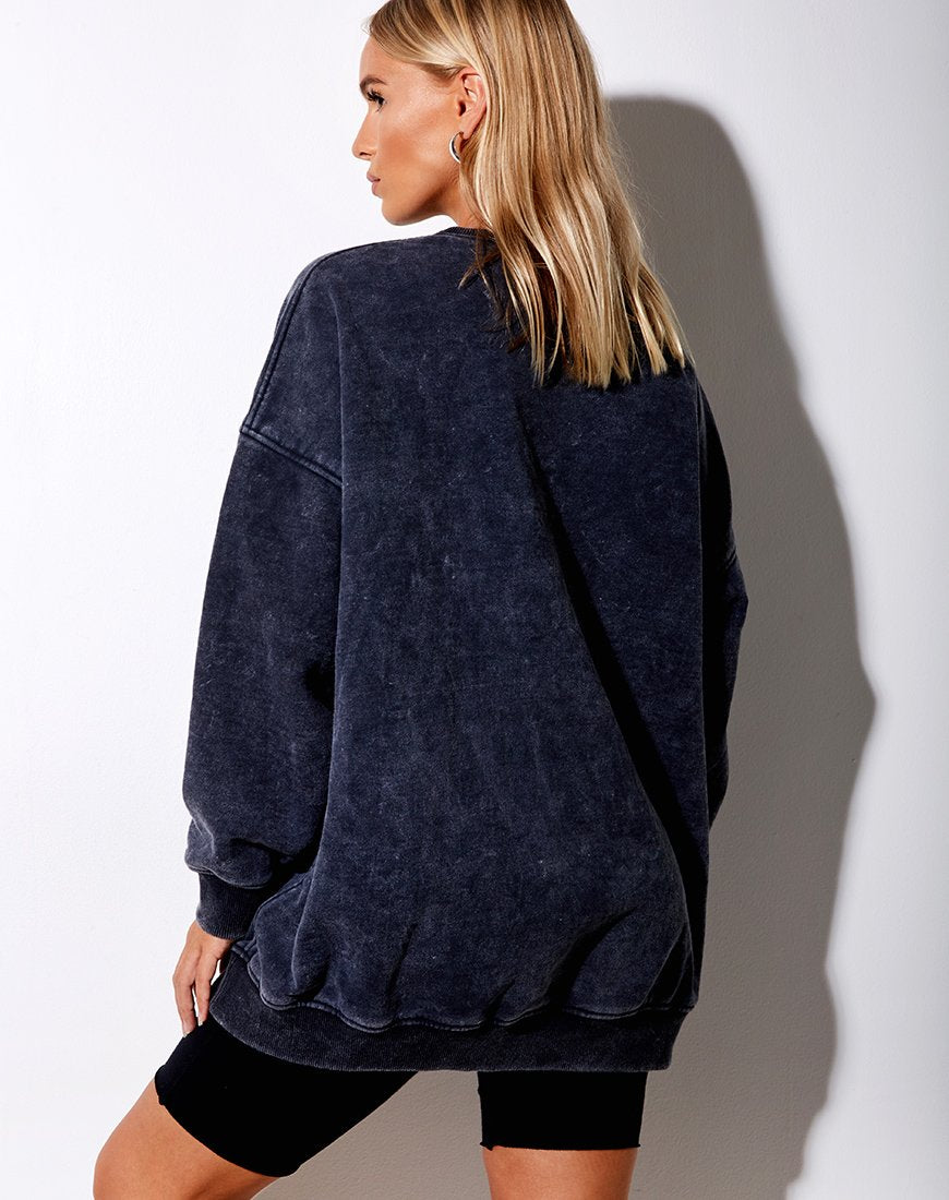 Imagen de sudadera Glo en negro lavado a la piedra Cosmos