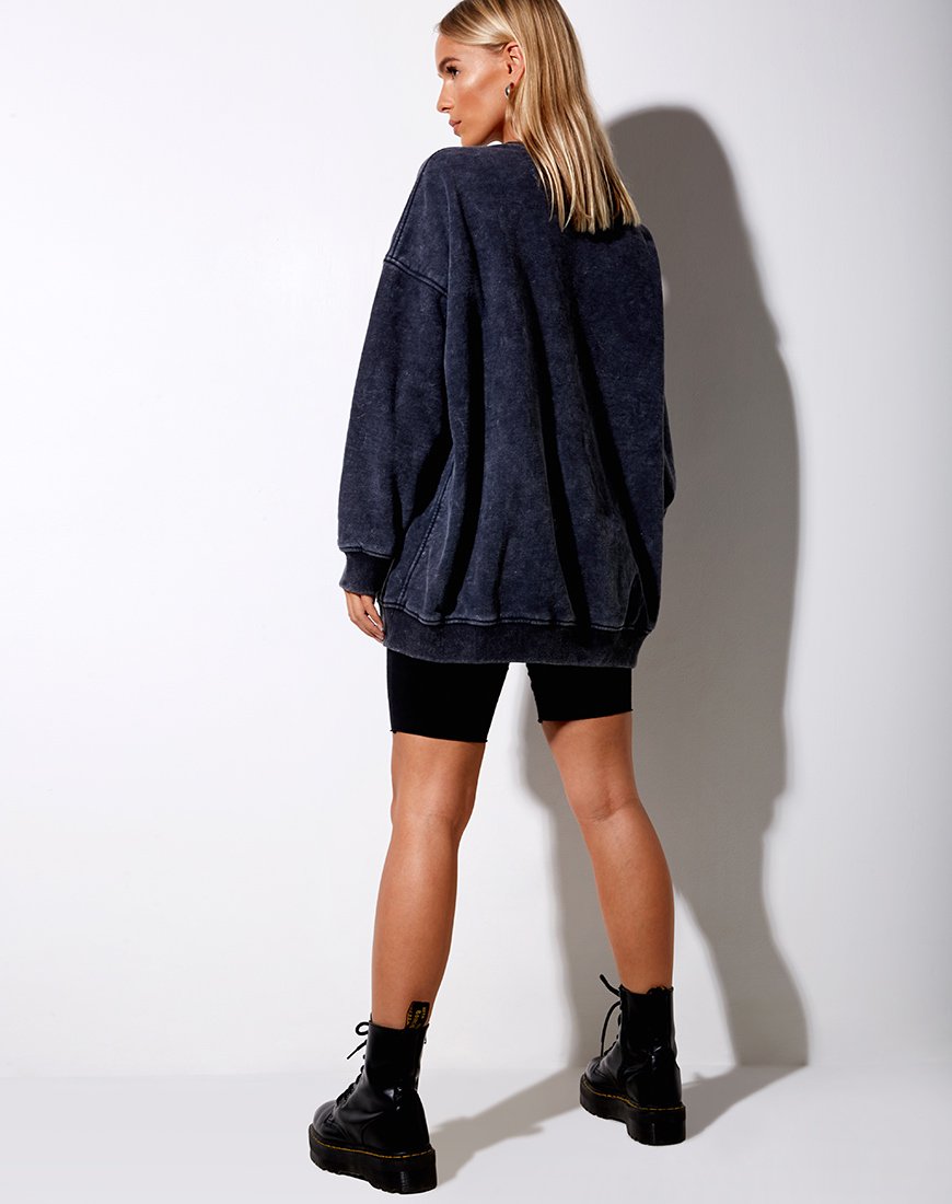 Imagen de sudadera Glo en negro lavado a la piedra Cosmos