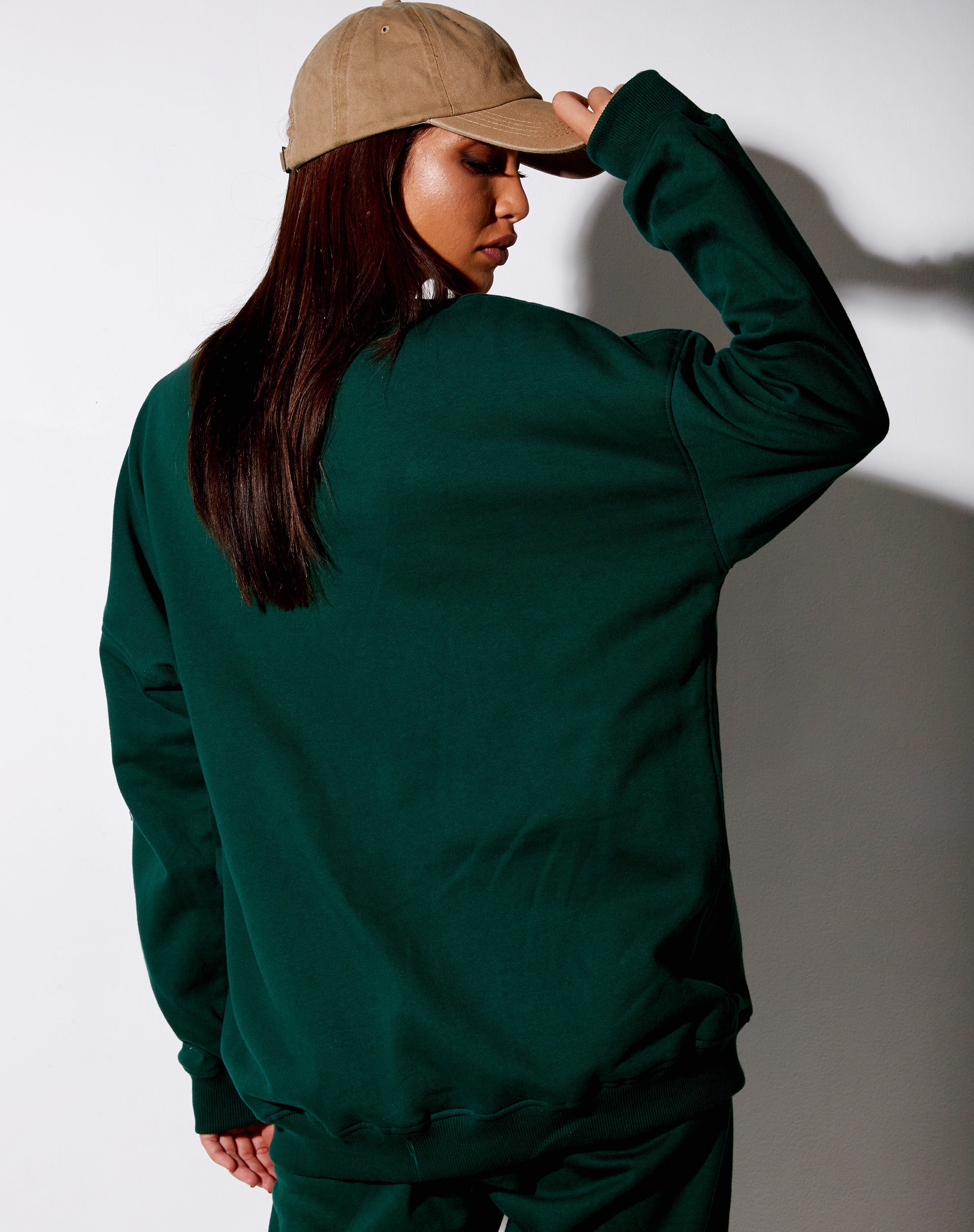 Imagen de sudadera Glo en verde botella con bordado Take Care Of Yourself