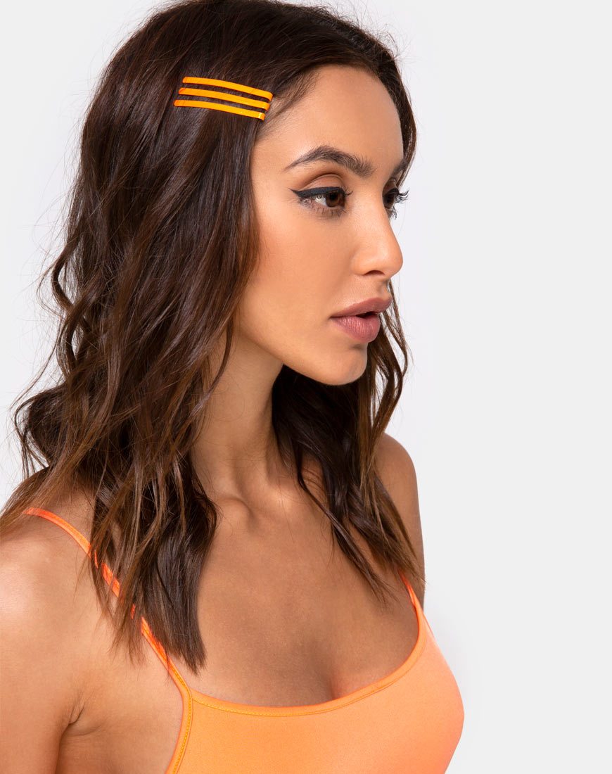 Image of Juego de pinzas para el pelo de neón en naranja