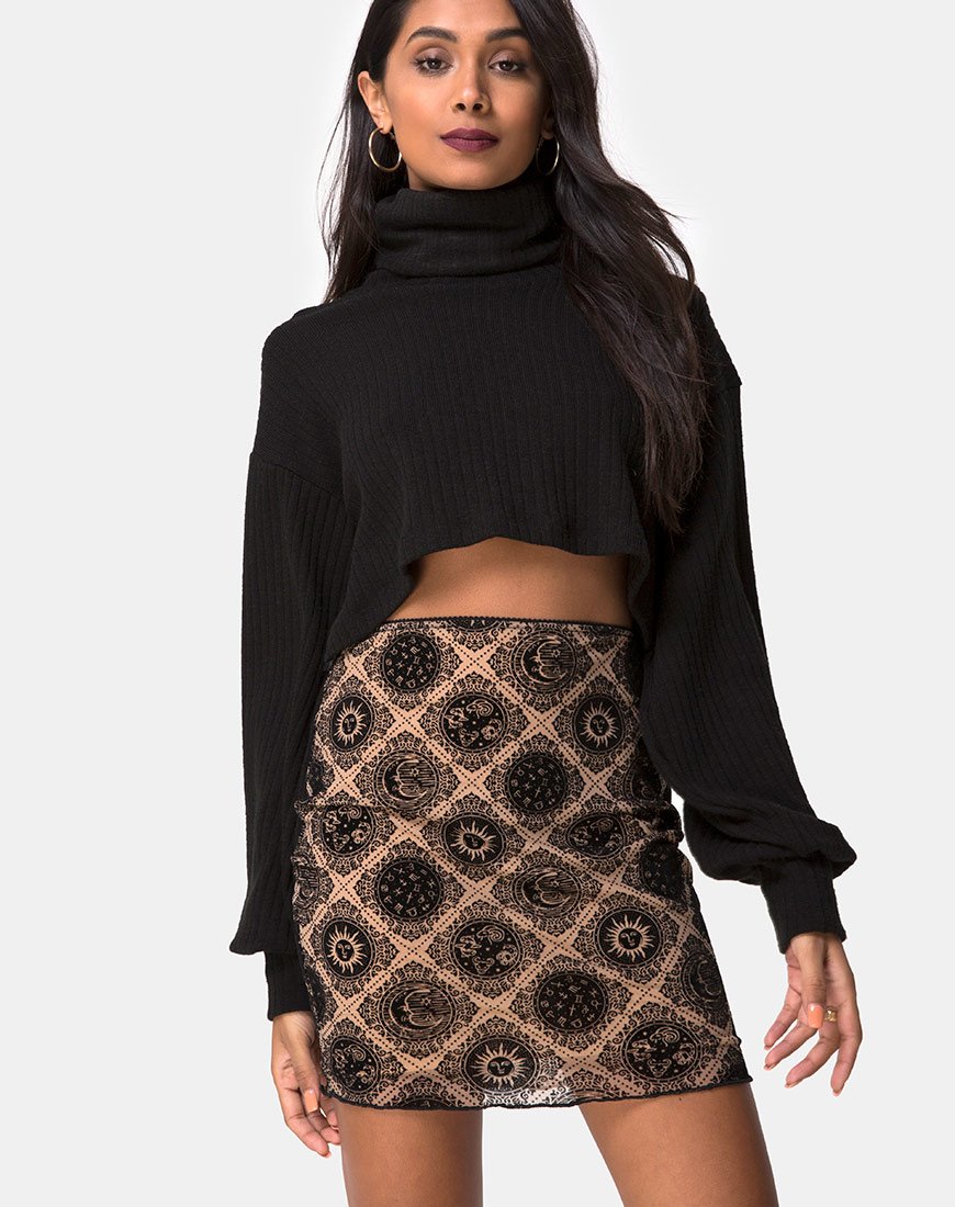 Minifalda Kinnie de malla topo con estampado de signos negros