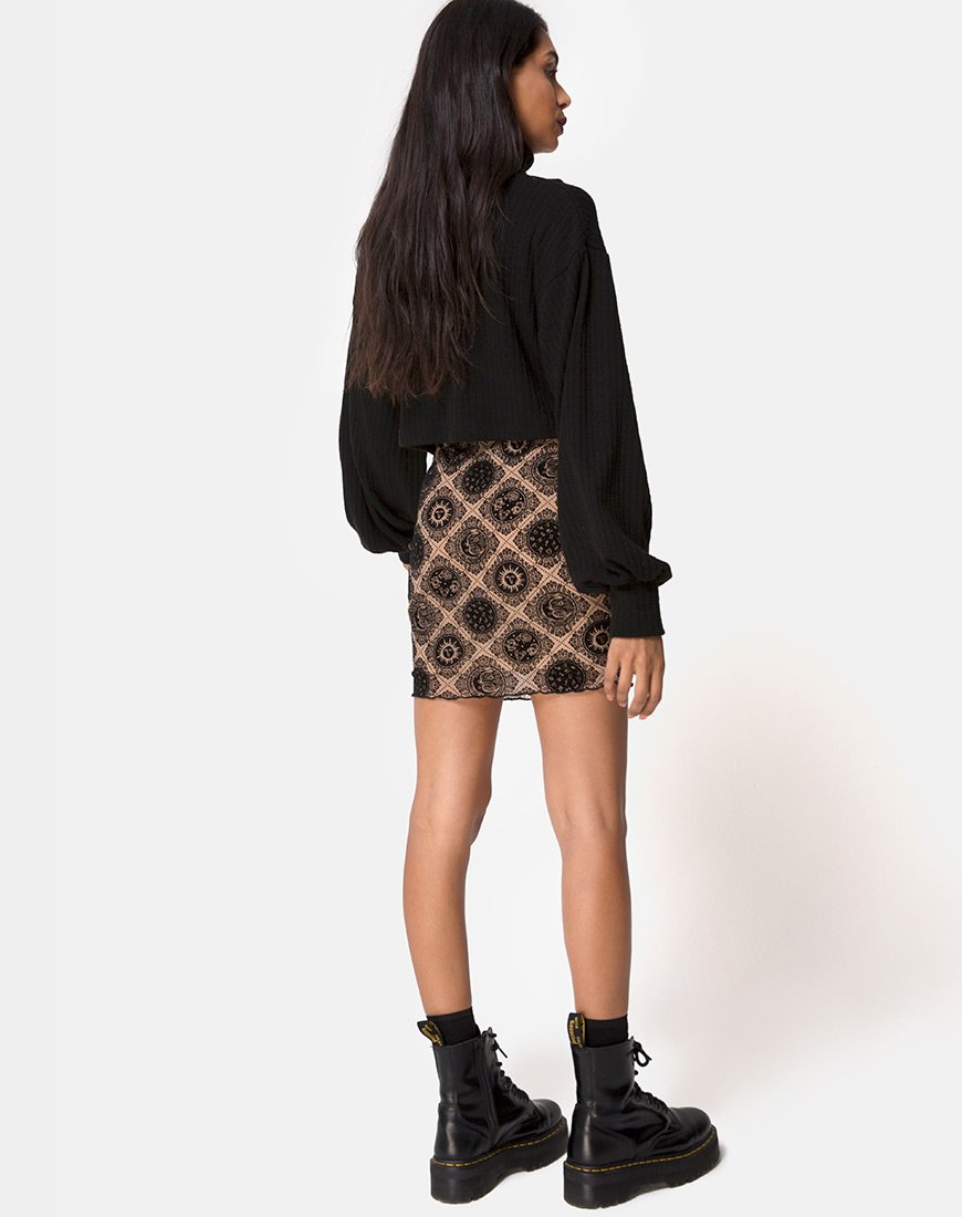 Imagen de la minifalda Kinnie de red topo con estampado de signos negros