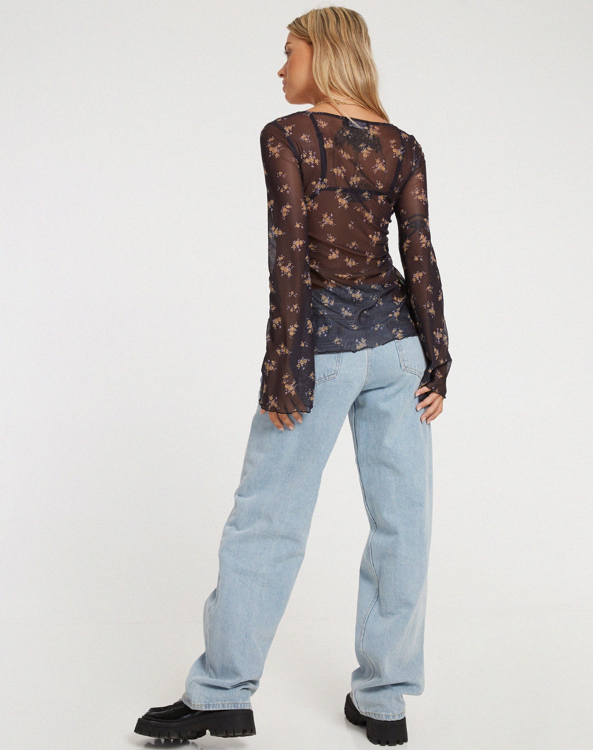 IMAGEN DE Leony Cardi en Femme Floral Negro y Oro