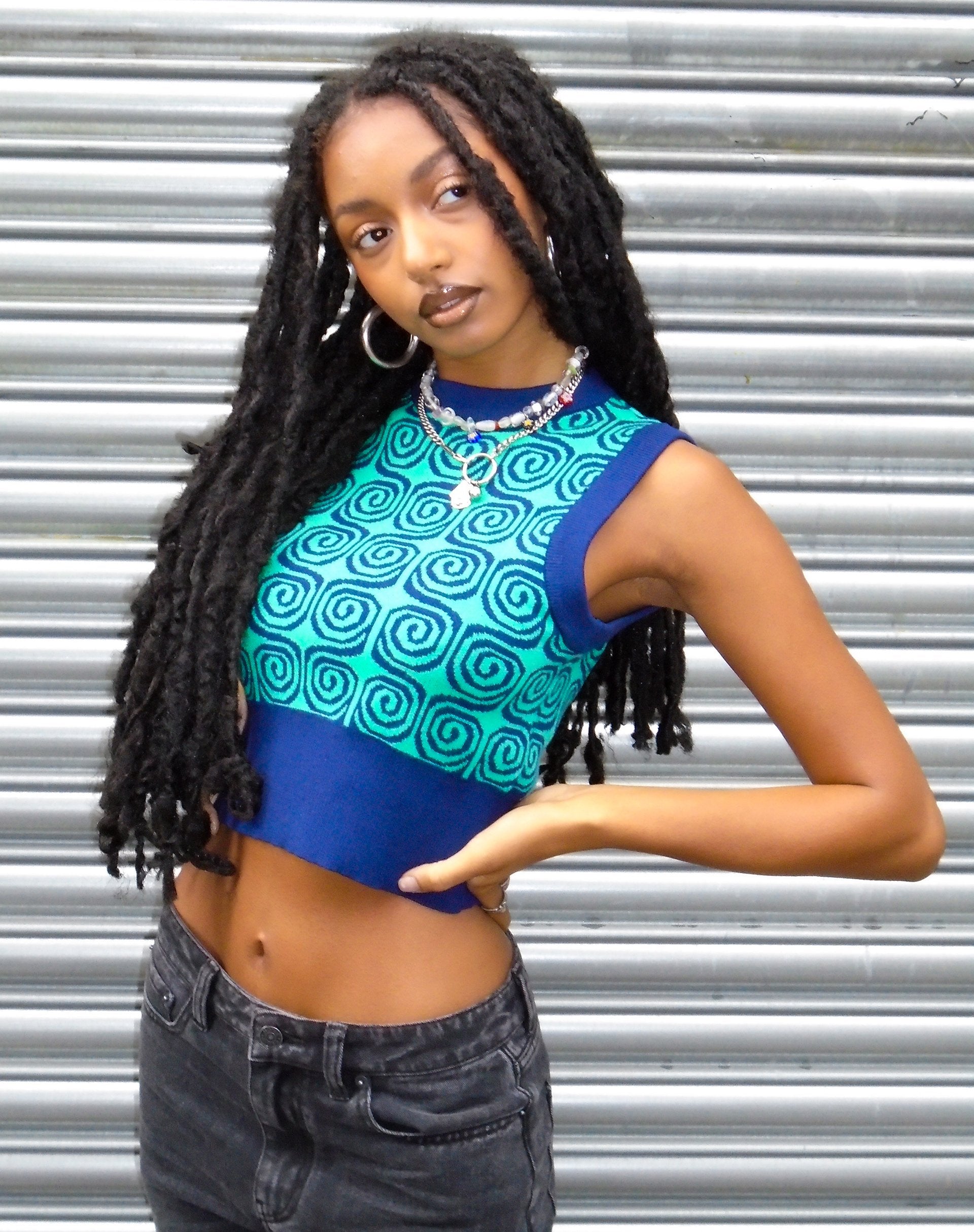 Imagen de Jaya Chaleco jersey en espiral verde y azul