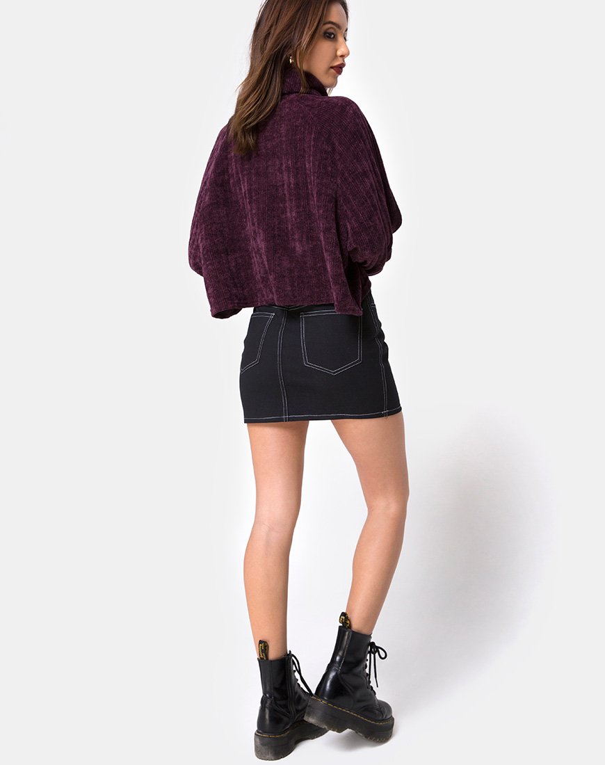 Imagen de la minifalda Broomy en negro con punto blanco