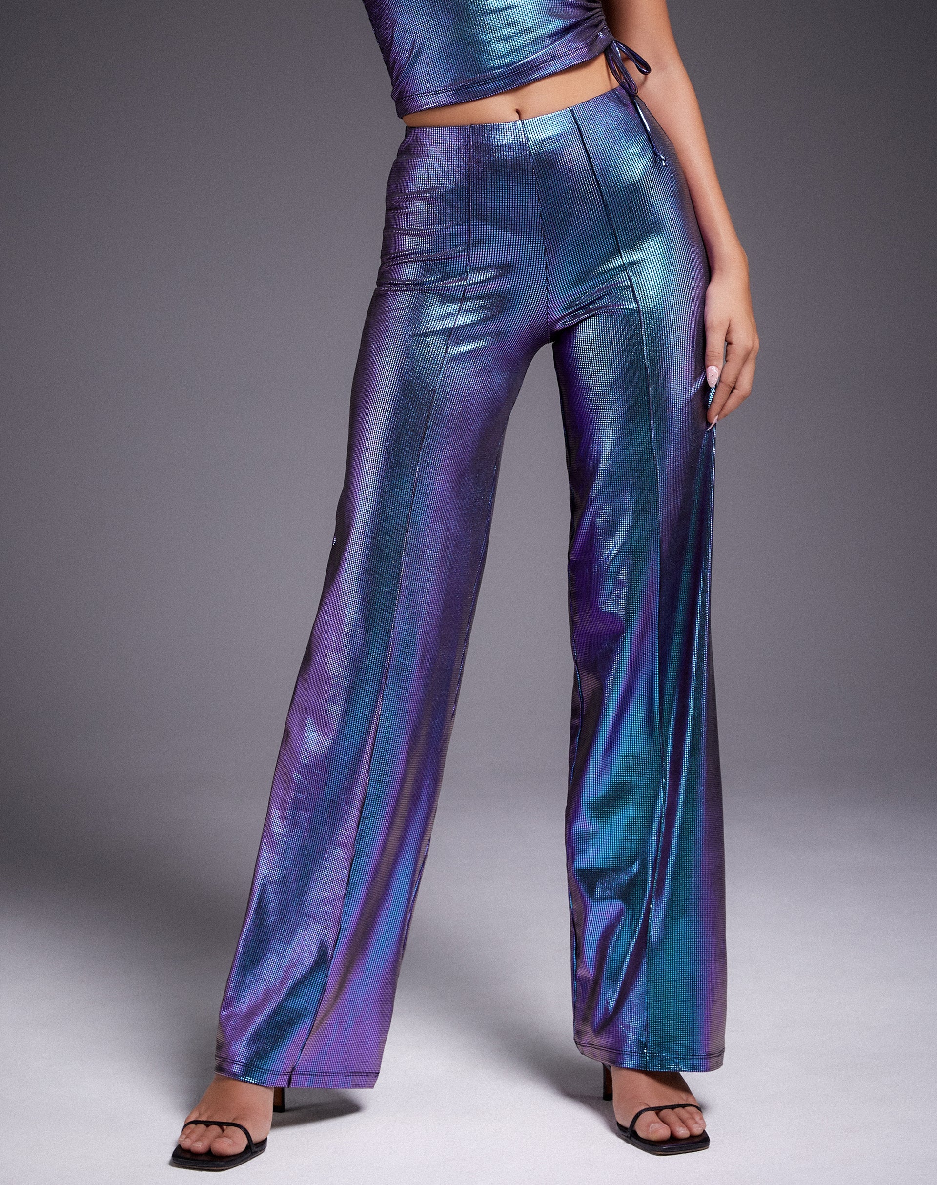 Imagen del pantalón Pista en morado holográfico