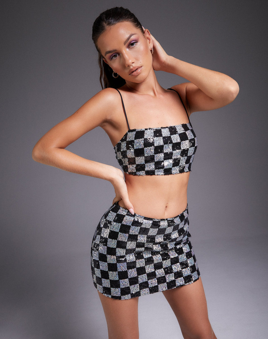 Top Keyan de lentejuelas en damero negro y plateado